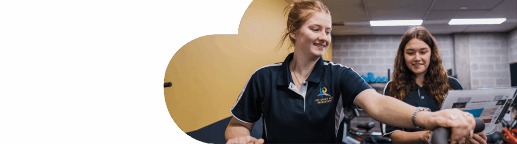 Two female students doing sports science