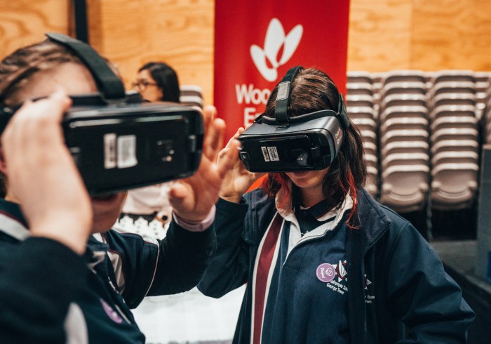 School students using virtual reality headsets