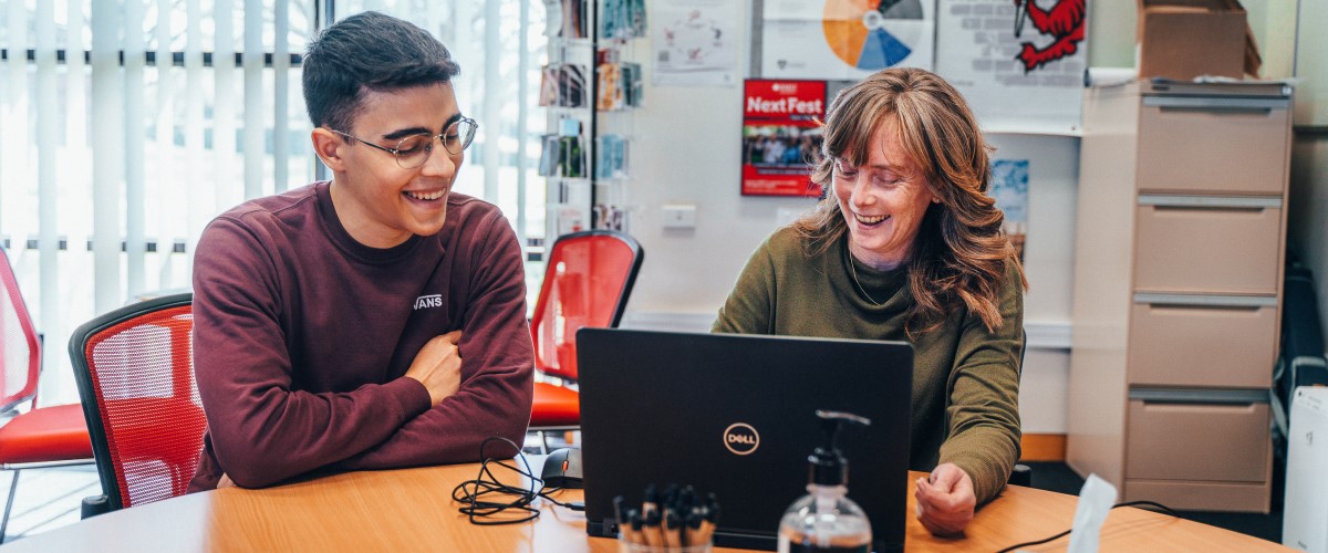 Teacher and student discussing their transition plan